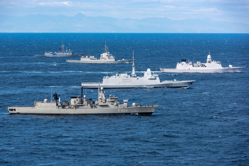 IONIAN SEA, Feb 25, 2019. NATO warships sail in formation while performing Dynamic Manta's Photo exercise. Dynamic Manta is an NATO Maritime Command-led exercise designed to sharpen the anti-submarine warfare and anti-surface ship warfare skills of the participating units. Dynamic Manta 2019 will be conducted in vicinity of Italy from 25 February to 8 March and include participants from 10 NATO Allies . Canada, France, Germany, Greece, Italy, Netherlands, Spain, Turkey, the United Kingdom and the United States provide in total 5 submarines, 9 ASW surface ships, 6 MPAs and 11 Rotary Wing Aircraft (Helicopters) to participate in this exercise. NATO Photo by FRAN WO Christian Valverde.